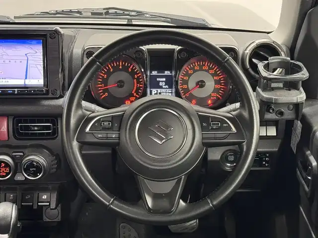 スズキ ジムニー シエラ JC 三重県 2021(令3)年 3.8万km ブルーイッシュブラックパール3 ガソリン/パートタイム4WD/フロア4AT/カロッツェリア 8インチ『楽ナビ』 AVIC-RL711/（CD/DVD/MSV/SD/FM/AM/TV/Bluetooth/iPod/USB/HDMI/AUX）/バックカメラ/ドライブレコーダー 前後/ビルトイン ETC/安全/・デュアルセンサーブレーキサポート/・車線逸脱警報機能/・ふらつき警報機能/・標識認識機能/・ハイビームアシスト/・トラクションコントロールシステム/・ヒルディセントコントロール/など/装備/・シートカバー（革調）/・クルーズコントロール/・シートヒーター（D/N）/・オートエアコン/・ステアリングスイッチ/・オートライト/・LEDヘッドランプ/・フロントフォグランプ/・プッシュスタート/・電動格納ドアミラー/・純正15inAW/・背面スペアタイヤ/・保/取/ナビ取/・スマートキーx1/など
