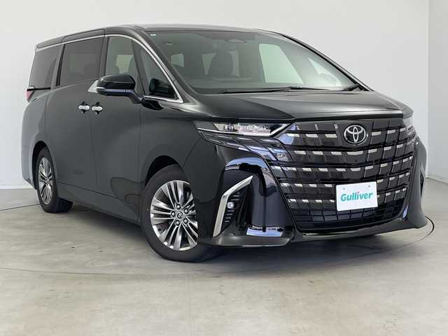 トヨタ アルファードハイブリット Z 新潟県 2024(令6)年 0.6万km ブラック ムーンルーフ/純正14インチコネクティッドナビ/フルセグTV/BT/USB/バック/サイド/フロントカメラ/・ブラインドスポットモニター/・クリアランスソナー/カラーヘッドアップディスプレイ/ETC2.0/おくだけ充電/デジタルインナーミラー/ステアリングヒーター/快適温熱シート/ベンチレーションシート（フロント・セカンドシート）/リヤヒーターエアカーテン/D/N席パワーシート/レザーシート/ウッドコンビステアリング/パワースライドドア/パワーバックドア/オートライト/3眼LEDヘッドランプ/純正18インチアルミホイール/パワーサイドサンシェード/プッシュスタート/スマートキー