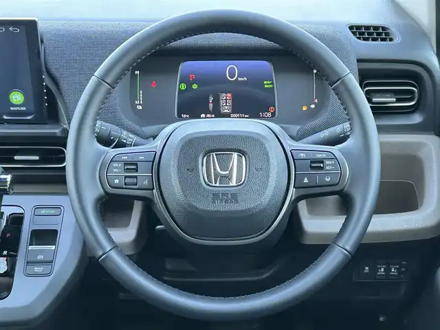 ホンダ フリード ハイブリット e:HEV AIR EX 群馬県 2025(令7)年 0.1万km プラチナホワイトパール ホンダセンシング/・衝突軽減ブレーキ（CMBS）/・歩行者事故低減ステアリング/・路外逸脱抑制機能/・渋滞追従機能付アダプティブクルーズコントロール/・車線維持支援システム（LKAS）/・ブラインドスポットインフォメーション/・誤発進抑制機能/・後方誤発進抑制機能/・パーキングセンサーシステム/・アダプティブドライビングビーム/両側パワースライドドア/LEDヘッドライト/ハーフレザーシート/D/Nシートヒーター/プッシュスタート/スマートキー/ステアリングリモコン/純正15インチアルミホイール