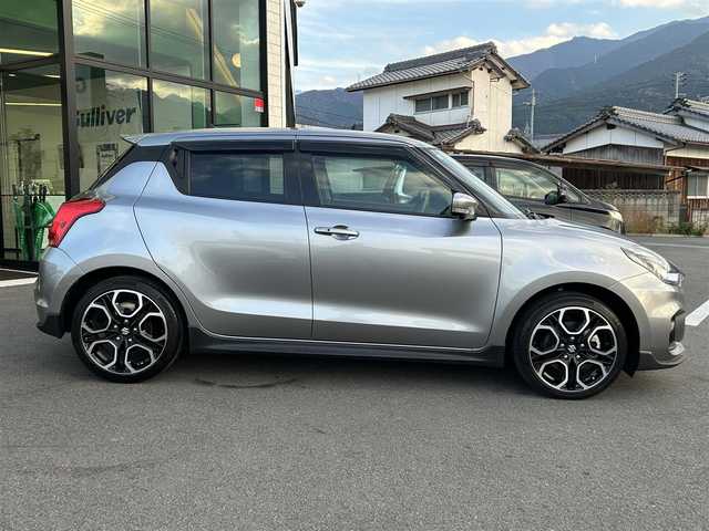 スズキ スイフト スポーツ 愛媛県 2023(令5)年 5万km プレミアムシルバーメタリック 6速MT/純正8型ナビ（Bluetooth/フルセグTV）/アラウンドビューモニター/アダプティブクルーズコントロール/ETC/前後ドライブレコーダー/純正フロアマット/純正17インチアルミホイール/ブラインドスポットモニター/スズキセーフティサポート/ステアリングリモコン/トノカバー/前後コーナーセンサー/LEDヘッドライト/スマートキー
