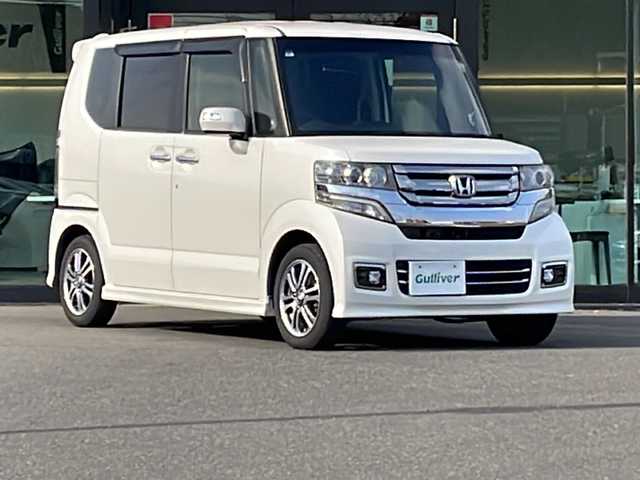 ホンダ Ｎ ＢＯＸ カスタム G SSパッケージ 鹿児島県 2017(平29)年 5.1万km プレミアムホワイトパールⅡ 社外SDナビ/Bluetooth/TV/フルセグ/CD/DVD/AM/FM/ワンオーナー/両側パワースライドドア/バックカメラ/ETC/シートヒーター/横滑り防止装置/ABS/純正フロアマット/純正AW１４インチ/ドアバイザー/電動格納ミラー/スペアキー