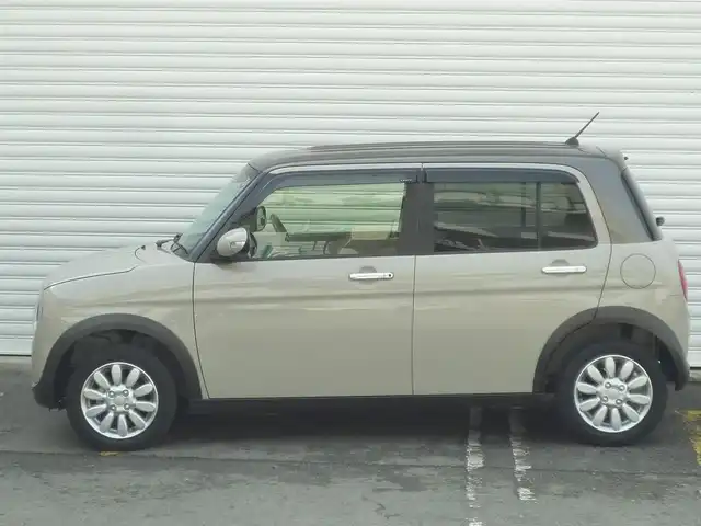 スズキ ラパン X 和歌山県 2020(令2)年 2.2万km フォーンベージュM 走行距離　21367km（登録時）/スズキセーフティサポート/・レーザーレーダーと単眼カメラ/・デュアルセンサーブレーキサポート/・誤発信抑制機能/・車線逸脱警報/・ふらつき警報/・先行者発信お知らせ機能/・ハイビームアシスト/・標識認識機能/・後退時ブレーキサポート/・後方誤発進抑制機能/・リヤパーキングセンサー/シートヒーター(運転席）/SDナビ（CN-RZ875）/フルセグテレビ（CD・DVD・BT）/ETC車載器（ビルトインタイプ）/ステアリングスイッチ/ISOFIX/スマートキー