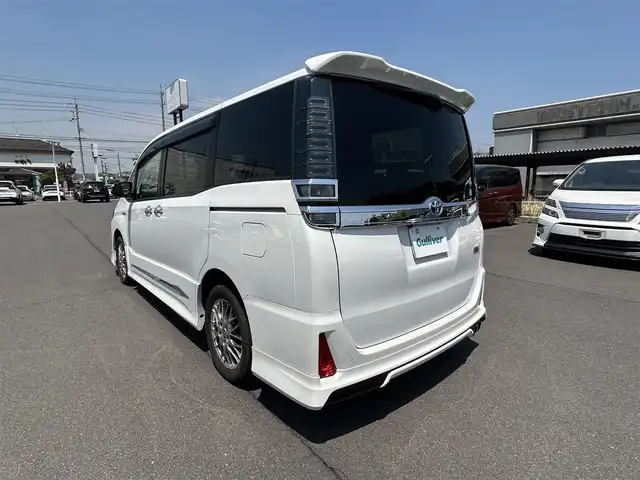 トヨタ ヴォクシー ハイブリッド ZS 煌Ⅱ 岡山県 2019(平31)年 5.1万km ホワイトパールクリスタルシャイン モデリスタエアロ/純正10インチナビ/（AM.FM.BT.TV.CD.DVD）/純正フリップダウンモニター/両側パワースライドドア/トヨタセーフティセンス/・プリクラッシュセーフティ/・オートマチックハイビーム/・レーンディパーチャアラート/バックカメラ/LEDヘッドライト/フォグランプ/びるといんETC/WAC