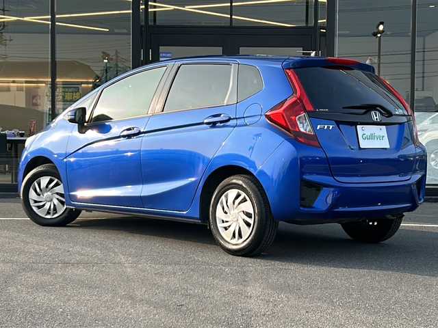 ホンダ フィット 13G Fパッケージ 茨城県 2014(平26)年 12万km ブリリアントスポーティブルーメタリック2トーン 横滑り防止装置/14インチ純正アルミホイール/Bluetooth/USB入力端子/バックカメラ/ワンセグテレビ/純正SDナビ/アイドリングストップ/スマートキー/純正フロアマット