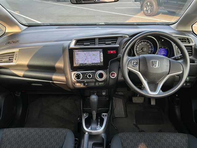 ホンダ フィット 13G Fパッケージ 茨城県 2014(平26)年 12万km ブリリアントスポーティブルーメタリック2トーン 横滑り防止装置/14インチ純正アルミホイール/Bluetooth/USB入力端子/バックカメラ/ワンセグテレビ/純正SDナビ/アイドリングストップ/スマートキー/純正フロアマット