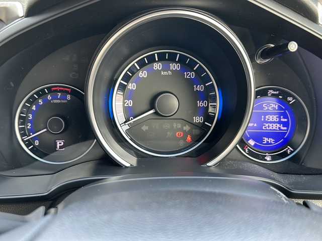 ホンダ フィット 13G Fパッケージ 茨城県 2014(平26)年 12万km ブリリアントスポーティブルーメタリック2トーン 横滑り防止装置/14インチ純正アルミホイール/Bluetooth/USB入力端子/バックカメラ/ワンセグテレビ/純正SDナビ/アイドリングストップ/スマートキー/純正フロアマット