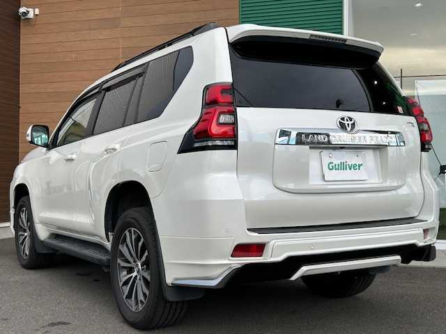 トヨタ ランドクルーザー プラド TX Lパッケージ 静岡県 2021(令3)年 2.5万km ホワイトパールクリスタルシャイン 純正ナビ/AM/FM/BT/フルセグ/全方位カメラ/純正フロアマット/レーダークルーズコントロール/レザーシート/サンルーフ/オートライト/ドライブレコーダー前後/モデリスタエアロ/ETC2.0