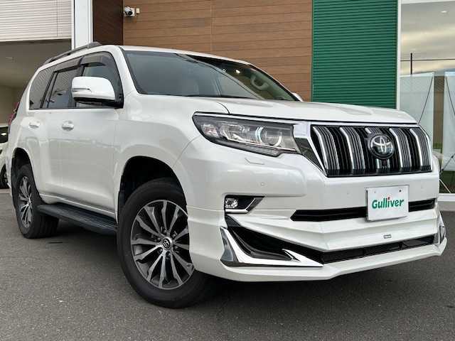 トヨタ ランドクルーザー プラド TX Lパッケージ 静岡県 2021(令3)年 2.5万km ホワイトパールクリスタルシャイン 純正ナビ/AM/FM/BT/フルセグ/全方位カメラ/純正フロアマット/レーダークルーズコントロール/レザーシート/サンルーフ/オートライト/ドライブレコーダー前後/モデリスタエアロ/ETC2.0