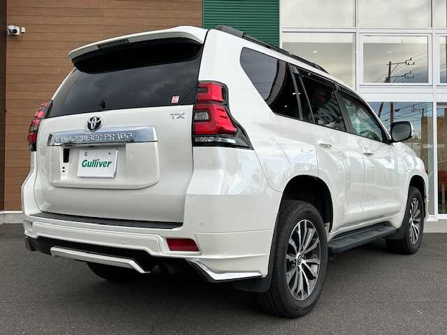 トヨタ ランドクルーザー プラド TX Lパッケージ 静岡県 2021(令3)年 2.5万km ホワイトパールクリスタルシャイン 純正ナビ/AM/FM/BT/フルセグ/全方位カメラ/純正フロアマット/レーダークルーズコントロール/レザーシート/サンルーフ/オートライト/ドライブレコーダー前後/モデリスタエアロ/ETC2.0