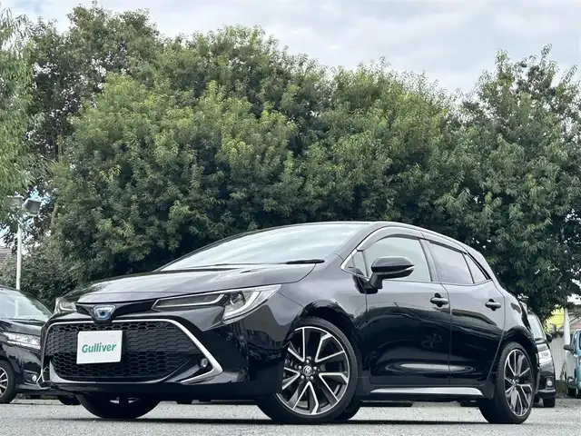 トヨタ カローラ スポーツ ハイブリッドG Z 東京都 2021(令3)年 2.9万km アティチュードブラックマイカ ワンオーナー/R4/5/6/7年分ディーラー整備記録簿あり/赤本革×ウルトラスエードコンビシート/前席シートヒーター/9インチディスプレイオーディオ/バックカメラ/純正ビルトインETC2.0/前後ドライブレコーダー(DRV-MR450)/純正18インチアルミホイール/ステアリングヒーター/Bi-BeamLEDヘッドランプ/インテリジェントクリアランスソナー/パーキングサポートブレーキ/ブラインドスポットモニター/Toyota Safety Sense