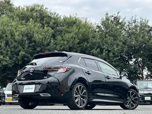 トヨタ カローラ スポーツ ハイブリッドG Z 東京都 2021(令3)年 2.9万km アティチュードブラックマイカ ワンオーナー/R4/5/6/7年分ディーラー整備記録簿あり/赤本革×ウルトラスエードコンビシート/前席シートヒーター/9インチディスプレイオーディオ/バックカメラ/純正ビルトインETC2.0/前後ドライブレコーダー(DRV-MR450)/純正18インチアルミホイール/ステアリングヒーター/Bi-BeamLEDヘッドランプ/インテリジェントクリアランスソナー/パーキングサポートブレーキ/ブラインドスポットモニター/Toyota Safety Sense