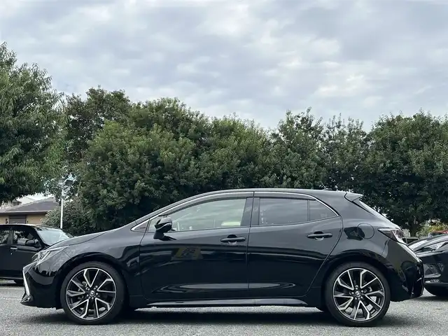 トヨタ カローラ スポーツ ハイブリッドG Z 東京都 2021(令3)年 2.9万km アティチュードブラックマイカ ワンオーナー/R4/5/6/7年分ディーラー整備記録簿あり/赤本革×ウルトラスエードコンビシート/前席シートヒーター/9インチディスプレイオーディオ/バックカメラ/純正ビルトインETC2.0/前後ドライブレコーダー(DRV-MR450)/純正18インチアルミホイール/ステアリングヒーター/Bi-BeamLEDヘッドランプ/インテリジェントクリアランスソナー/パーキングサポートブレーキ/ブラインドスポットモニター/Toyota Safety Sense