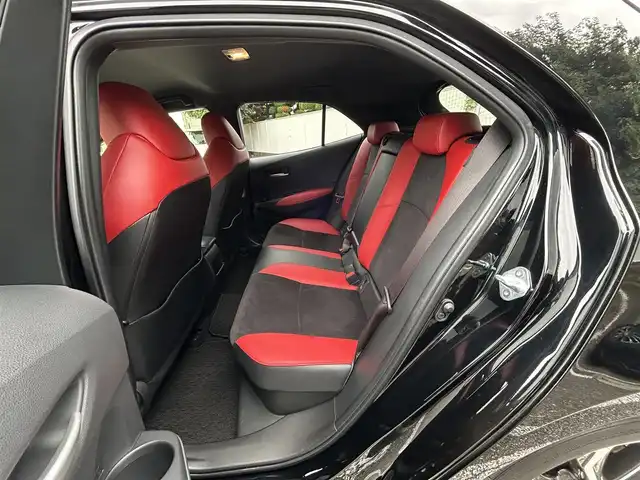 トヨタ カローラ スポーツ ハイブリッドG Z 東京都 2021(令3)年 2.9万km アティチュードブラックマイカ ワンオーナー/R4/5/6/7年分ディーラー整備記録簿あり/赤本革×ウルトラスエードコンビシート/前席シートヒーター/9インチディスプレイオーディオ/バックカメラ/純正ビルトインETC2.0/前後ドライブレコーダー(DRV-MR450)/純正18インチアルミホイール/ステアリングヒーター/Bi-BeamLEDヘッドランプ/インテリジェントクリアランスソナー/パーキングサポートブレーキ/ブラインドスポットモニター/Toyota Safety Sense