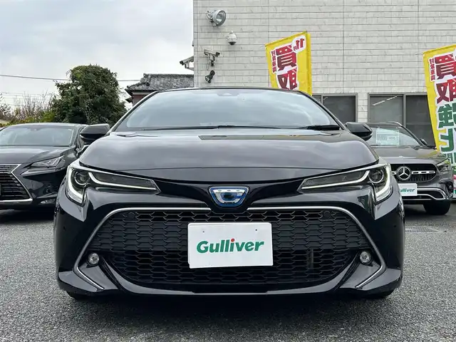トヨタ カローラ スポーツ ハイブリッドG Z 東京都 2021(令3)年 2.9万km アティチュードブラックマイカ ワンオーナー/R4/5/6/7年分ディーラー整備記録簿あり/赤本革×ウルトラスエードコンビシート/前席シートヒーター/9インチディスプレイオーディオ/バックカメラ/純正ビルトインETC2.0/前後ドライブレコーダー(DRV-MR450)/純正18インチアルミホイール/ステアリングヒーター/Bi-BeamLEDヘッドランプ/インテリジェントクリアランスソナー/パーキングサポートブレーキ/ブラインドスポットモニター/Toyota Safety Sense