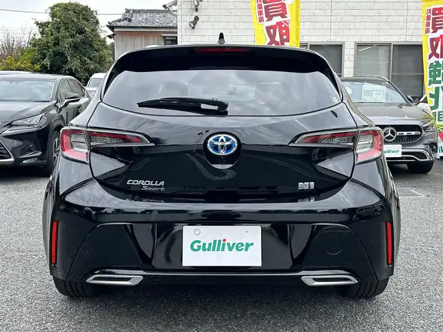 トヨタ カローラ スポーツ ハイブリッドG Z 東京都 2021(令3)年 2.9万km アティチュードブラックマイカ ワンオーナー/R4/5/6/7年分ディーラー整備記録簿あり/赤本革×ウルトラスエードコンビシート/前席シートヒーター/9インチディスプレイオーディオ/バックカメラ/純正ビルトインETC2.0/前後ドライブレコーダー(DRV-MR450)/純正18インチアルミホイール/ステアリングヒーター/Bi-BeamLEDヘッドランプ/インテリジェントクリアランスソナー/パーキングサポートブレーキ/ブラインドスポットモニター/Toyota Safety Sense