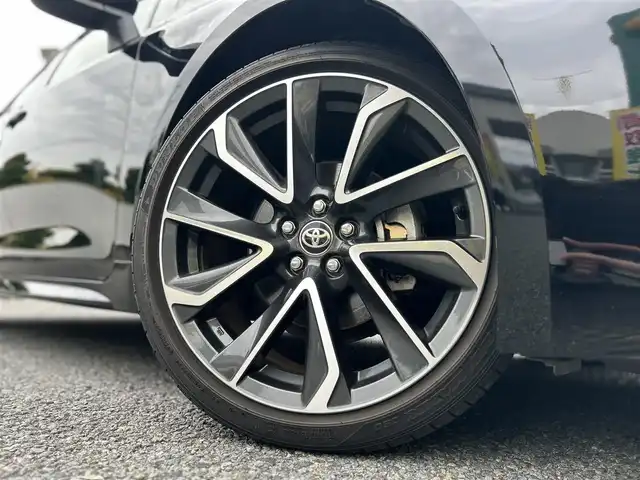 トヨタ カローラ スポーツ ハイブリッドG Z 東京都 2021(令3)年 2.9万km アティチュードブラックマイカ ワンオーナー/R4/5/6/7年分ディーラー整備記録簿あり/赤本革×ウルトラスエードコンビシート/前席シートヒーター/9インチディスプレイオーディオ/バックカメラ/純正ビルトインETC2.0/前後ドライブレコーダー(DRV-MR450)/純正18インチアルミホイール/ステアリングヒーター/Bi-BeamLEDヘッドランプ/インテリジェントクリアランスソナー/パーキングサポートブレーキ/ブラインドスポットモニター/Toyota Safety Sense