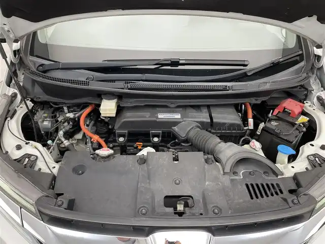 ホンダ ステップワゴン スパーダ ハイブリッド G EX ホンダセンシング 滋賀県 2018(平30)年 7.1万km プラチナホワイトパール 純正10インチナビ/(CD/DVD/フルセグ/Bluetooth)/マルチビューカメラ/フリップダウンモニター/両側電動スライド/追従クルーズコントロール/前後ドラレコ/ハーフレザーシート/シートヒーター(D/N)/ETC/LEDヘッドライト/オートライト/スマートキー/プッシュスタート