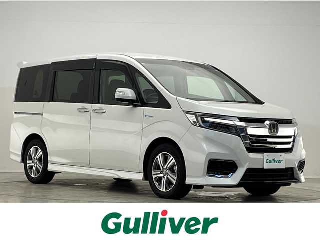 ホンダ ステップワゴン スパーダ ハイブリッド G EX ホンダセンシング 滋賀県 2018(平30)年 7.1万km プラチナホワイトパール 純正10インチナビ/(CD/DVD/フルセグ/Bluetooth)/マルチビューカメラ/フリップダウンモニター/両側電動スライド/追従クルーズコントロール/前後ドラレコ/ハーフレザーシート/シートヒーター(D/N)/ETC/LEDヘッドライト/オートライト/スマートキー/プッシュスタート