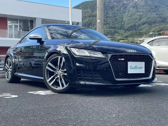 アウディ ＴＴクーペ 2．0 TFSI 長崎県 2015(平27)年 8万km ミトスブラックメタリック 純正ナビ（AM、FM、BT、フルセグ）/MT付きAT/パドルシフト/ETC/デジタルインナーミラー型ドラレコ/ステアリングスイッチ/バーチャルコックピット/電動リアスポイラー/革巻きステアリング/フロアマット/取扱説明書/保証書