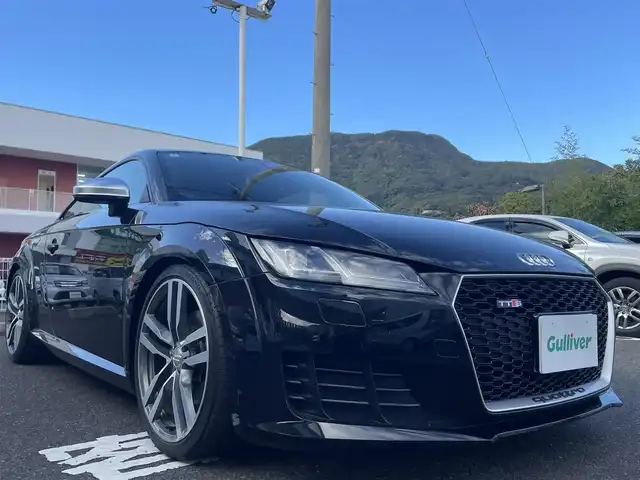 アウディ ＴＴクーペ 2．0 TFSI 長崎県 2015(平27)年 8万km ミトスブラックメタリック 純正ナビ（AM、FM、BT、フルセグ）/MT付きAT/パドルシフト/ETC/デジタルインナーミラー型ドラレコ/ステアリングスイッチ/バーチャルコックピット/電動リアスポイラー/革巻きステアリング/フロアマット/取扱説明書/保証書