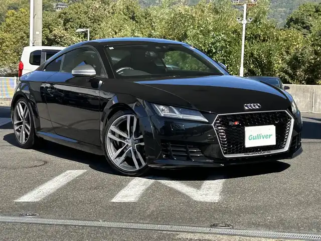 アウディ ＴＴクーペ 2．0 TFSI 長崎県 2015(平27)年 8万km ミトスブラックメタリック 純正ナビ（AM、FM、BT、フルセグ）/MT付きAT/パドルシフト/ETC/デジタルインナーミラー型ドラレコ/ステアリングスイッチ/バーチャルコックピット/電動リアスポイラー/革巻きステアリング/フロアマット/取扱説明書/保証書