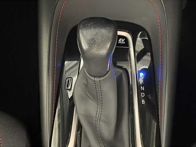 トヨタ カローラ スポーツ ハイブリッドG Z 沖縄県 2019(令1)年 5.4万km ホワイトパールクリスタルシャイン 禁煙車/ワンオーナー/ＴＲＤフルエアロ/トヨタセーフティーセンス/・プリクラクションセーフティー/・車線逸脱抑制機能/純正9インチナビ/・CD／DVD/Bluetooth／フルセグTV/ブラインドスポットモニター/前後ドライブレコーダー/前後コーナーセンサー/純正アルミ/デジタルインナーミラー/ＥＴＣ/スペアキー1本/取扱説明書/保証書