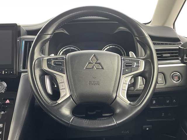 三菱 デリカＤ：５ P 鹿児島県 2019(平31)年 8.7万km ウォームホワイトパール 純正ナビ　/（フルセグ/Bluetooth/CD/DVD/AM/FM）/フリップダウンモニター　/全周囲カメラ　/ブラインドスポットモニター　/レーダークルーズコントロール　/パドルシフト　/パワーシート　/オートハイビーム/両側パワースライドドア　/ＥＴＣ　/前後ドライブレコーダー/シートヒーター/オートブレーキホールド/AC100V/プッシュスタートボタン/保証書/取扱説明書/スペアキー1本