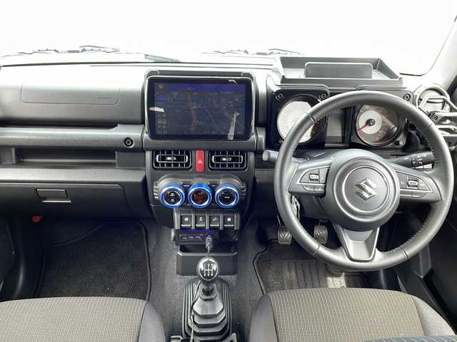 スズキ ジムニー シエラ JC 秋田県 2023(令5)年 4.2万km ミディアムグレー 5Fミッション車/4WD/ETC/Panasonic製9インチナビ　型式　CN-F1DVD/（Bluetooth/フルセグTV/DVD/CD/SD）/バックカメラ/クルーズコントロール/シートヒーター/15インチ純正アルミホイール/プッシュスタートボタン/スマートキー/オートエアコン/アイドリングストップ/車線逸脱警報/衝突被害軽減システム
