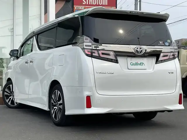 トヨタ ヴェルファイア ZG 道央・札幌 2018(平30)年 0.5万km ホワイトパールクリスタルシャイン ・４WD/・ワンオーナー/・衝突軽減ブレーキ/・寒冷地仕様/・両側パワースライドドア/・ローダウン/・ハーフレザーシート/・パワーシート/・ブラインドスポットモニター/・デジタルインナーミラー/・純正ナビ/　CD＆DVD＆BT＆TV/・バックカメラ/・フリップダウンモニター/・パーキングアシスト/・レーダークルーズコントロール/・シートヒーター/・アイドリングストップ/・コーナーセンサー/・レーンキープアシスト/・純正エンジンスターター/・前後ドライブレコーダー/・パワーバックドア/・オートエアコン/・オートライト/・オートリトラミラー/・レインセンサーワイパー/・ワイパー熱線/・ステアリングヒーター/・プッシュスタート/・スマートキー/・MT付きAT/・ビルトインETC/・社外AW＆冬タイヤ積込/・純正サスペンション積込/・JBLプレミアムサウンド/・純正フロアマット/・ウィンカーミラー/・フォグライト/・ドアバイザー/・スペアキー