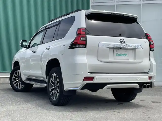 トヨタ ランドクルーザー プラド TX Lパッケージ 福岡県 2022(令4)年 1.9万km ホワイトパールクリスタルシャイン トヨタセーフティセンス/横滑り防止/盗難防止/レーンキープ/コーナーセンサー/バッグカメラ/アランドビュー/エアバッグ/カーテンエアバッグ/ドラレコ/ナビ/フルセグTV/BT/純正アルミホイール/エアロパーツ/プッシュスタート/スマートキー/オートライト/オートマチックハイビーム/LEDヘッド/パワーシート/サンルーフ/電動格納サードシート/４WD/エアシート/シートヒーター/ルーフレール/DUALエアコン/１２０Vソケット/USB