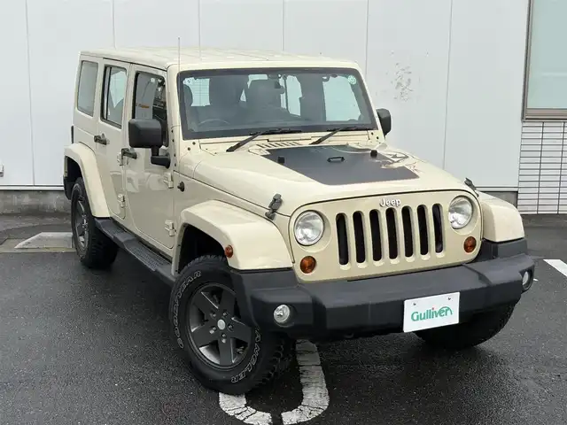 クライスラー・ジープ ジープ ラングラー アンリミテッド トレイルED 三重県 2011(平23)年 6.3万km ベージュ 50台限定特別仕様車/リザードエンボス入ブラウン革シート/専用ボディ色(サハラタンクリアコート)/ボディ同色ハードトップ/オーバーフェンダー/リザードデカール/ブラックフューエルフィラードア/バックカメラ/ETC/ナビ(Bluetooth/地デジTV/AM/FM)/スペアキー