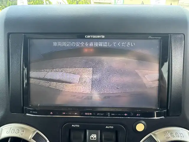 クライスラー・ジープ ジープ ラングラー アンリミテッド トレイルED 三重県 2011(平23)年 6.3万km ベージュ 50台限定特別仕様車/リザードエンボス入ブラウン革シート/専用ボディ色(サハラタンクリアコート)/ボディ同色ハードトップ/オーバーフェンダー/リザードデカール/ブラックフューエルフィラードア/バックカメラ/ETC/ナビ(Bluetooth/地デジTV/AM/FM)/スペアキー