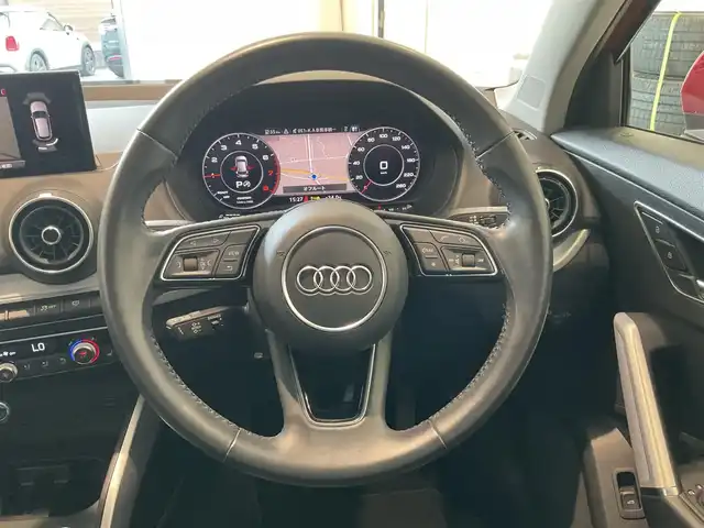 アウディ Ｑ２ 30TFSIスポーツ 熊本県 2018(平30)年 3.5万km 赤 ・スマートキー/・プッシュスタート/・パーキングエイド/・距離警告/・Audiプレセンス/・Audiサイドアシスト/・Audiアクティブレーンアシスト/・休憩の推奨/・ハイビームアシスト/・クルーズコントロール(追従式)/・シートヒーター /・純正メモリナビ/　【DVD・Bluetooth・USB・SD・AUX】/・フルセグTV/・バックカメラ/・バーチャルコクピット/・ドライブレコーダー(前方録画)/・パワーバックドア/・LEDヘッドランプ/・保証書/取説