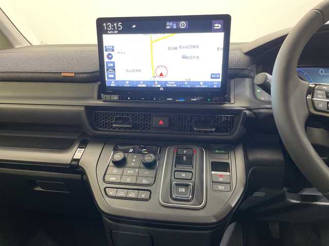 ホンダ ステップワゴン eHEV エアー EX 愛媛県 2025(令7)年 0.1千km プラチナホワイトパール 登録済未使用車/11.4インチナビHonda CONNECTナビ /フルセグ/Bluetooth/バックカメラ/衝突被害軽減ブレーキ/レーンアシスト/アダクティブクルーズコントロール/両側電動スライドドア/電動リアゲート/ＤＮ席シートヒーター/ＢＳＭ/前後コーナーセンサー/オットマン/禁煙車