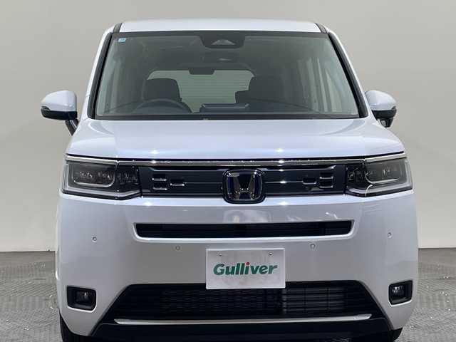 ホンダ ステップワゴン eHEV エアー EX 愛媛県 2025(令7)年 0.1千km プラチナホワイトパール 登録済未使用車/11.4インチナビHonda CONNECTナビ /フルセグ/Bluetooth/バックカメラ/衝突被害軽減ブレーキ/レーンアシスト/アダクティブクルーズコントロール/両側電動スライドドア/電動リアゲート/ＤＮ席シートヒーター/ＢＳＭ/前後コーナーセンサー/オットマン/禁煙車