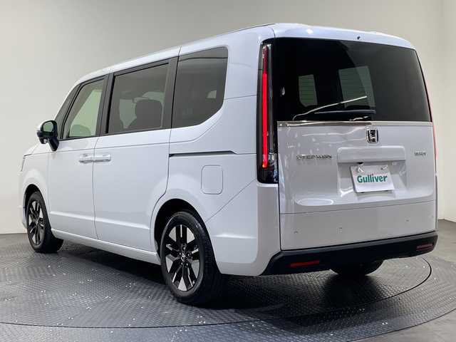 ホンダ ステップワゴン eHEV エアー EX 愛媛県 2025(令7)年 0.1千km プラチナホワイトパール 登録済未使用車/11.4インチナビHonda CONNECTナビ /フルセグ/Bluetooth/バックカメラ/衝突被害軽減ブレーキ/レーンアシスト/アダクティブクルーズコントロール/両側電動スライドドア/電動リアゲート/ＤＮ席シートヒーター/ＢＳＭ/前後コーナーセンサー/オットマン/禁煙車