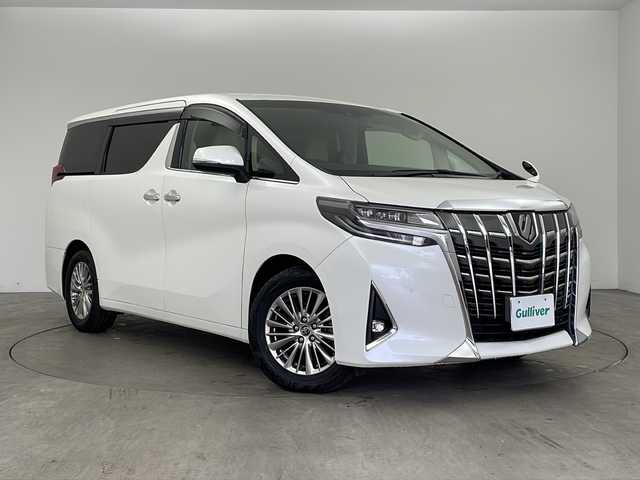 トヨタ アルファード G 兵庫県 2019(平31)年 5.9万km ホワイトパールクリスタルシャイン ・ALPINE製9インチナビ＆フルセグ＆BT＆DVD/・ALPINE製10.1インチフリップダウンモニター/・バックカメラ/・革シート/・シートヒーター/・エアーシート/・両側パワースライドドア/・バックカメラ/・トヨタセーフティーセンス/・プリクラッシュセーフティ/・レーダークルーズコントロール/・レーントレーシングアシスト/・パーキングサポートブレーキ/・ロードサインアシスト/・先行車発進告知/・オートマチックハイビーム/・クリアランスソナー/・ナノイー/・前後ドライブレコーダー/・ビルトインETC/・LEDヘッドライト/・フォグ/・オートライト/・純正17インチアルミホイール/・電動パーキングブレーキ/・オートブレーキホールド/・自動防眩ミラー/・W＋サイドエアバック/・カーテンエアバック