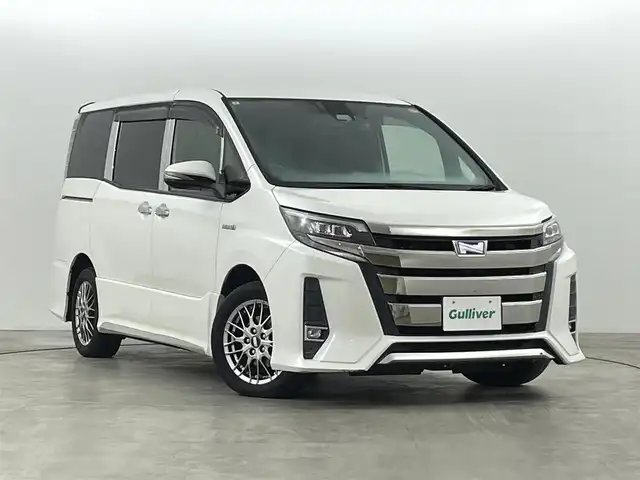 トヨタ ノア ハイブリッド Si ダブルバイビー 福島県 2018(平30)年 10万km ホワイトパールクリスタルシャイン トヨタセーフティセンス/純正9インチナビ/・フルセグ/TV/CD/DVD/BT/FM/AM/バックカメラ/両側パワースライドドア/LEDヘッドライト/・フォグライト/シートヒーター/社外BBSアルミホイール付きサマータイヤ/ステアリングスイッチ/ドラレコ前後/純正ビルドインETC2.0/プッシュスタート/・スマートキー