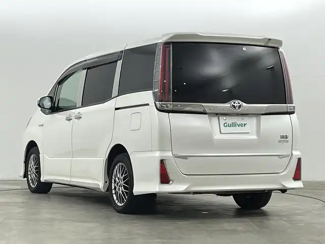 トヨタ ノア ハイブリッド Si ダブルバイビー 福島県 2018(平30)年 10万km ホワイトパールクリスタルシャイン トヨタセーフティセンス/純正9インチナビ/・フルセグ/TV/CD/DVD/BT/FM/AM/バックカメラ/両側パワースライドドア/LEDヘッドライト/・フォグライト/シートヒーター/社外BBSアルミホイール付きサマータイヤ/ステアリングスイッチ/ドラレコ前後/純正ビルドインETC2.0/プッシュスタート/・スマートキー