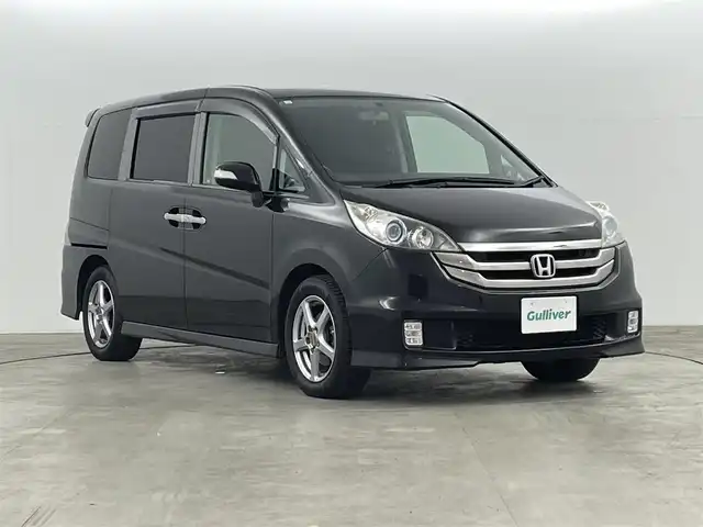 ホンダ ステップワゴン スパーダSHDDナビスマートスタイル 福島県 2009(平21)年 9万km プレミアムブラキッシュパール 純正ＨＤＤナビ/・バックカメラ/・ＣＤ／ＤＶＤ/・ＦＭ／ＡＭ/・ステアリングスイッチ/両側パワースライドドア/純正フロアマット/社外アルミホイール/ドアバイザー/ＨＩＤヘッドライト/オートミラー/スマートキー/・スペアキー