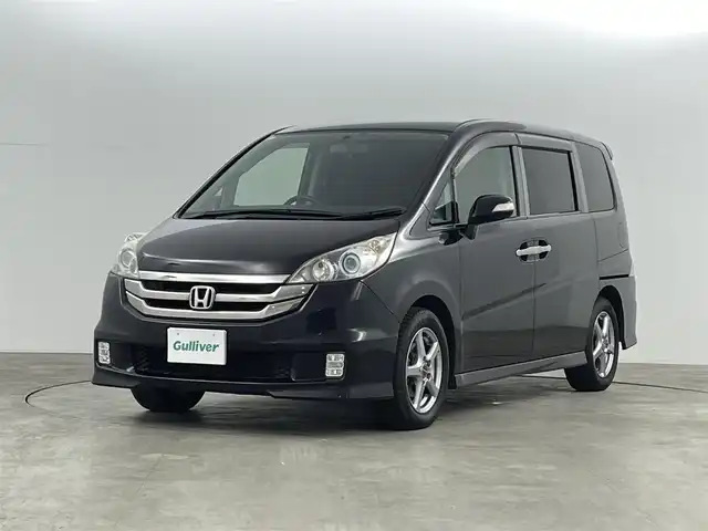 ホンダ ステップワゴン スパーダSHDDナビスマートスタイル 福島県 2009(平21)年 9万km プレミアムブラキッシュパール 純正ＨＤＤナビ/・バックカメラ/・ＣＤ／ＤＶＤ/・ＦＭ／ＡＭ/・ステアリングスイッチ/両側パワースライドドア/純正フロアマット/社外アルミホイール/ドアバイザー/ＨＩＤヘッドライト/オートミラー/スマートキー/・スペアキー