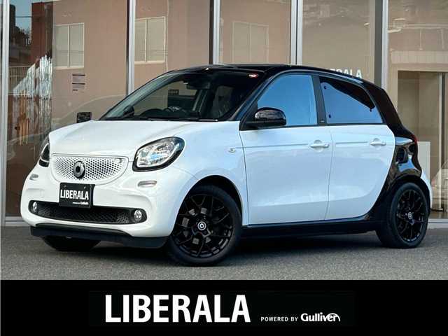 スマート ＭＣＣ スマート ターボ 福岡県 2017(平29)年 6万km 白 ガラスルーフ　/黒革　/Ｐａｎａｓｏｎｉｃナビ（ＣＮ－Ｇ１０００ＶＤ）　/純正オーディオ　/パドルシフト　/前席シートヒーター　/後ソナー　/キーレスキー　/純正１６インチＡＷ