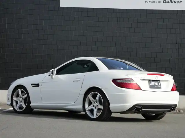 メルセデス・ベンツ ＳＬＫ２００ レーダーセーフティエディション 静岡県 2014(平26)年 4.6万km ポーラホワイト レーダーセーフティパッケージ/LKA/ACC/ブラインドスポットアシスト/パークトロニックセンサー/純正HDDナビ/　コマンドシステム/USB・DVD/フルセグTV/社外GPSレーダー/フロントドラレコ/DSRC車載器ETC/マジック・スカイコントロール付き/　パトリオットガラスルーフ（電動開閉式ハードトップ）/赤レザーシート/メモリ付きパワーシート/シートエアスカーフ/シートヒーター