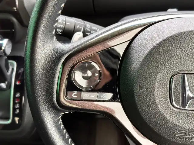 ホンダ Ｎ ＢＯＸ カスタム G L ターボ ホンダセンシング 宮城県 2018(平30)年 5.9万km プレミアムホワイトパールⅡ 禁煙車/登録時走行距離：58853km/ディーラーオプション純正8インチナビ/CD/DVD/フルセグTV/Bluetooth/バックカメラ/前方ドライブレコーダー/ビルトインETC/衝突被害軽減システム/後方センサー/横滑り防止装置/レーンキープアシスト/レーダークルーズコントロール/アイドリングストップ/LEDヘッドライト/フォグランプ/オートライト/ハーフレザーシート/パドルシフト/サンシェード/両側パワースライドドア/エンジンスタートボタン/スマートキー/純正フロアマット/純正15インチアルミホイール