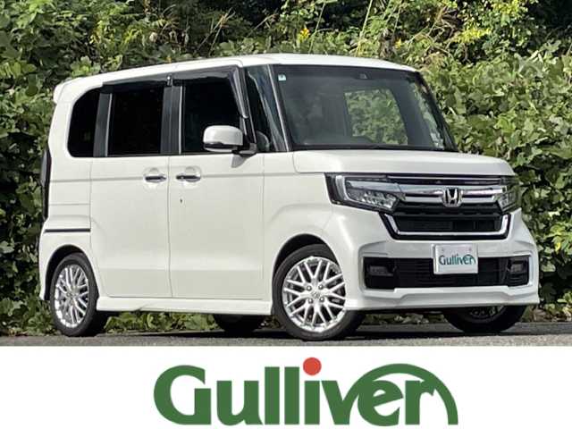 ホンダ Ｎ ＢＯＸ カスタム L ターボ 大分県 2022(令4)年 2.3万km プラチナホワイトパール オプションワンタッチスライドドア/両側パワースライドドア /ホンダセンシング/アダプティブクルーズコントロール/レーンキープアシスト/ハーフレザーシート/シートヒーター/純正メモリーナビ/バックカメラ/フルセグ/DVD/Bluetooth/前後ドライブレコーダー/大型ルーフコンソール/純正15インチアルミホイール/純正LEDヘッドライト/オートライトコントロール/ETC/ステアリングリモコン