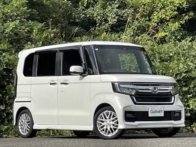 ホンダ Ｎ ＢＯＸ カスタム L ターボ 大分県 2022(令4)年 2.3万km プラチナホワイトパール オプションワンタッチスライドドア/両側パワースライドドア /ホンダセンシング/アダプティブクルーズコントロール/レーンキープアシスト/ハーフレザーシート/シートヒーター/純正メモリーナビ/バックカメラ/フルセグ/DVD/Bluetooth/前後ドライブレコーダー/大型ルーフコンソール/純正15インチアルミホイール/純正LEDヘッドライト/オートライトコントロール/ETC/ステアリングリモコン