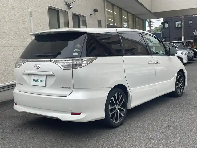 トヨタ エスティマ アエラス 静岡県 2012(平24)年 7.3万km ホワイトパールクリスタルシャイン ワンオーナー/純正ナビ/フルセグTV/DVD/CD/SD/BT/バックカメラ/純正フリップダウンモニター/両側パワースライドドア/ビルトインETC/HIDヘッドライト/ステアリングスイッチ/クルーズコントロール/スマートキー×2/保証書/取扱説明書/ナビ取扱説明書