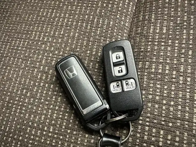 ホンダ Ｎ ＢＯＸ L コーディネートスタイル 兵庫県 2021(令3)年 1.8万km プレミアムアイボリーパールⅡ ・純正SDナビ/・CD/DVD/SD/BT/フルセグTV/・バックカメラ/・社外前方ドラレコ/・両側パワースライドドア /・LEDヘッドライト/・オートライト/・オートハイビーム/・コーナーセンサー/・衝突軽減ブレーキ/・レーンキープアシスト/・追従クルーズコントロール/・シートヒーターd/n/・スマートキー/・スペアキー1本/・プッシュスタート/・ステアリングスイッチ/・サマータイヤ積み込み/純正ホイールキャップ6mm
