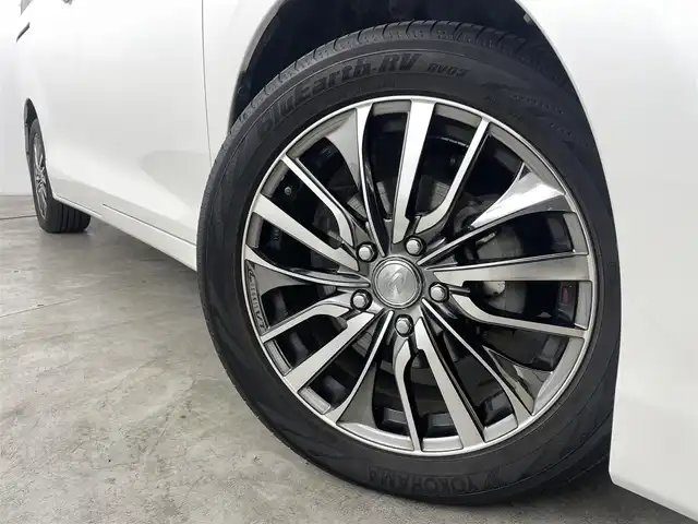 トヨタ エスクァイア ハイブリッド Gi プレミアムパッケージ 福島県 2019(平31)年 4.8万km ホワイトパールクリスタルシャイン クリアランスソナー/・衝突軽減/・オートハイビーム/純正フリップダウンモニター/純正9インチナビ/・BT/CD/DVD/AM/FM/バックカメラ/両側パワースライドドア/クルーズコントロール/LEDオートライト/・フォグライト/３列シート/・ハーフレザー/・ウォークスルー/・シートヒーター/・エアーシート/社外レオニスアルミホイール付きサマータイヤ/ETC/革ステアリング/・ステアリングリモコン/・ステアリングヒーター/純正フロアマット/純正ドアバイザー/アイドリングストップ/プッシュスタート/・スマートキー