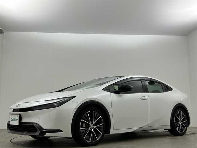 トヨタ プリウス Z 岡山県 2023(令5)年 2.1万km プラチナホワイトパールマイカ 純正１２．３インチナビ　衝突軽減ブレーキ　レーダークルーズコントロール　アラウンドビューモニター　ビルトインＥＴＣ２．０　ＬＥＤヘッドライト　シートヒーター　デジタルインナーミラー　置くだけ充電